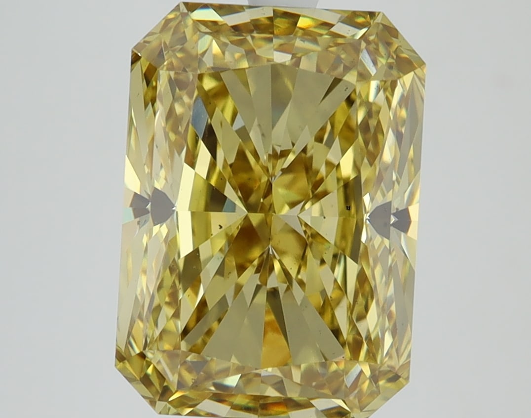Loose Diamond - RADIANT 5.25ct YELLOW VS2: Loose Diamond - RADIANT 5.25ct YELLOW VS2 Source: This is a real non-mined Diamond that has been grown in a lab Shape: RADIANT Carats: 5.25 Color: YELLOW Clarity: VS2 Certification: IGI Condition: Pre