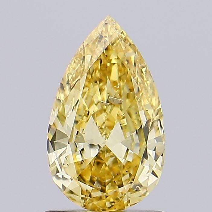 Loose Diamond - PEAR 0.96ct Fancy Vivid Yellow SI2: Loose Diamond - PEAR 0.96ct Fancy Vivid Yellow SI2 Source: This is a real non-mined Diamond that has been grown in a lab Shape: PEAR Carats: 0.96 Color: Fancy Vivid Yellow Certification: IGI Video: