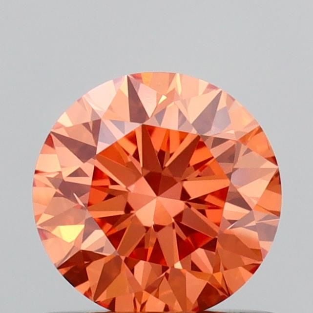 Loose Diamond - ROUND 0.73ct Fancy Vivid Orange VS1: Loose Diamond - ROUND 0.73ct Fancy Vivid Orange VS1 Source: This is a real non-mined Diamond that has been grown in a lab Shape: ROUND Carats: 0.73 Color: Fancy Vivid Orange Certification: NONE Video: