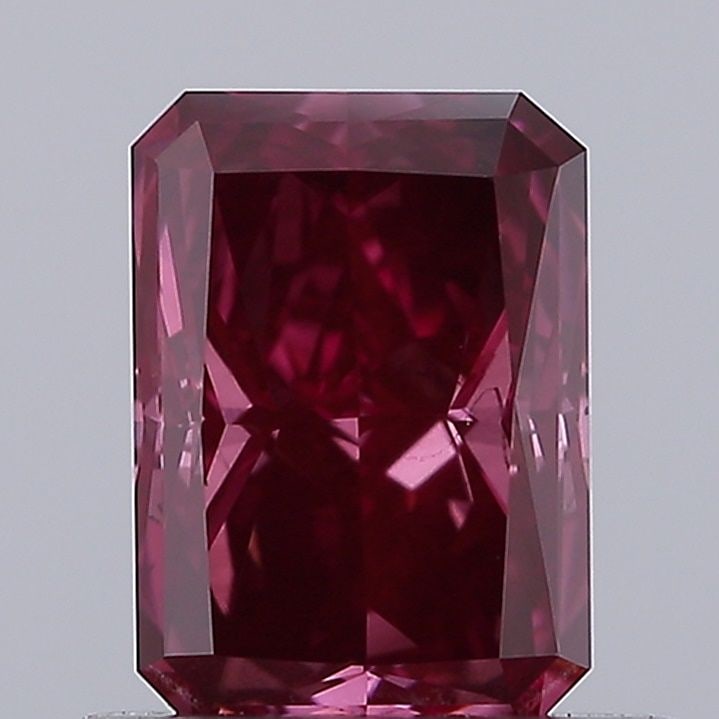Loose Diamond - RADIANT 0.73ct Fancy Deep Pink VS2: Loose Diamond - RADIANT 0.73ct Fancy Deep Pink VS2 Source: This is a real non-mined Diamond that has been grown in a lab Shape: RADIANT Carats: 0.73 Color: Fancy Deep Pink Certification: IGI Video: