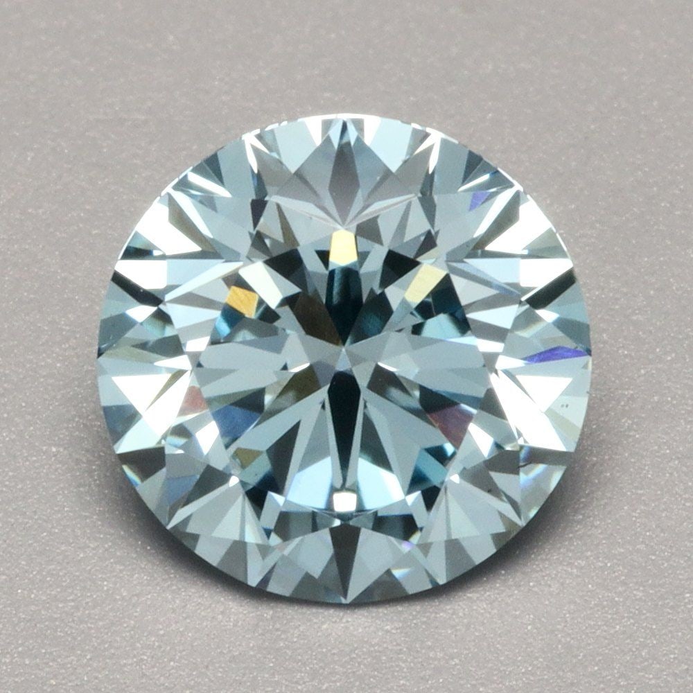 Ideal Loose Diamond - ROUND 1.5ct Fancy Vivid Blue VS2: Ideal Loose Diamond - ROUND 1.5ct Fancy Vivid Blue VS2 Source: This is a real non-mined Diamond that has been grown in a lab Shape: ROUND Carats: 1.5 Color: Fancy Vivid Blue Certification: IGI Video: