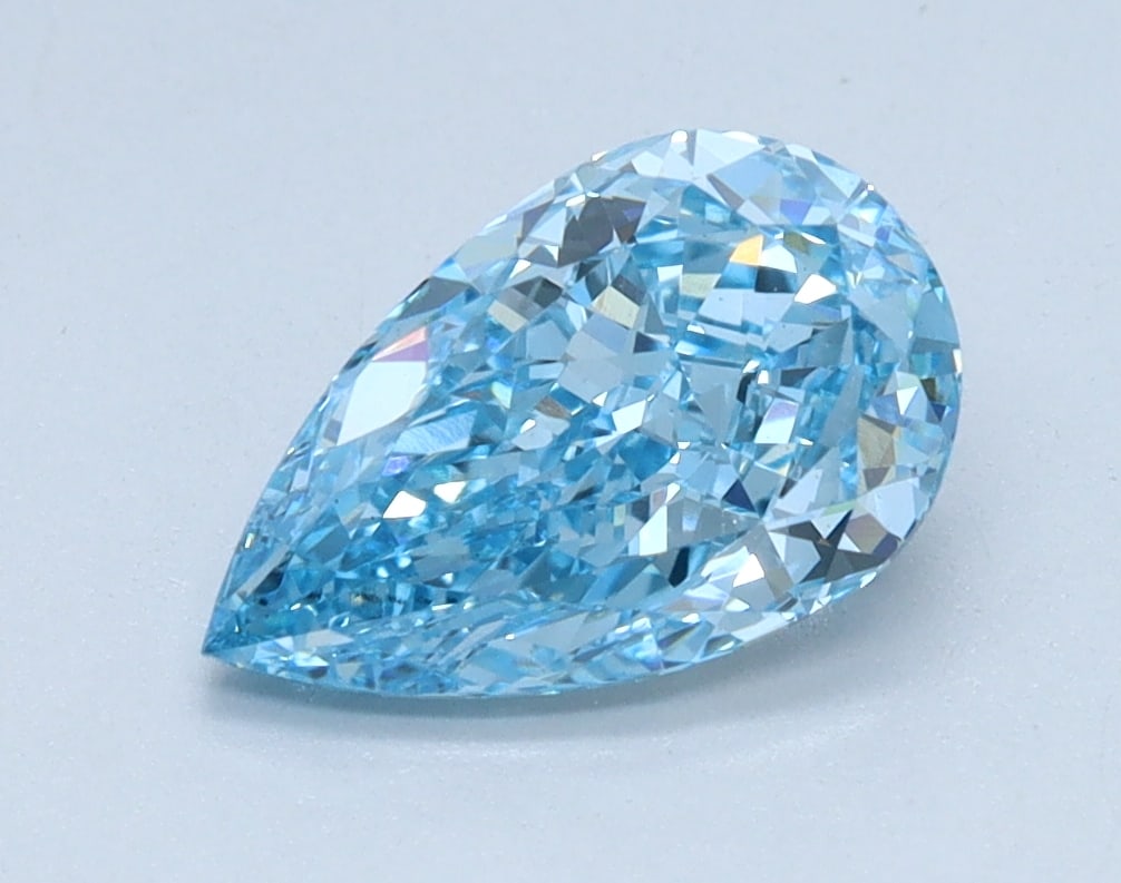 Loose Diamond - PEAR 1.29ct BLUE VS1: Loose Diamond - PEAR 1.29ct BLUE VS1 Source: This is a real non-mined Diamond that has been grown in a lab Shape: PEAR Carats: 1.29 Color: BLUE Clarity: VS1 Certification: IGI Condition: Pre-Owned PLE