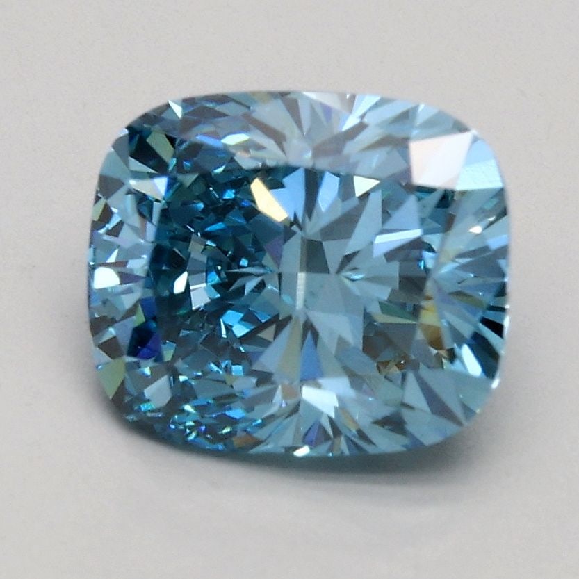 Loose Diamond - CUSHION BRILLIANT 1.56ct Fancy Vivid Blue VS1: Loose Diamond - CUSHION BRILLIANT 1.56ct Fancy Vivid Blue VS1 Source: This is a real non-mined Diamond that has been grown in a lab Shape: CUSHION BRILLIANT Carats: 1.56 Color: Fancy Vivid Blue Certif