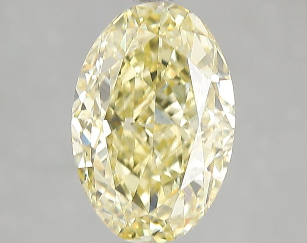 Loose Diamond - OVAL 3.06ct Fancy Intense Yellow VS1: Loose Diamond - OVAL 3.06ct Fancy Intense Yellow VS1 Source: This is a real non-mined Diamond that has been grown in a lab Shape: OVAL Carats: 3.06 Color: Fancy Intense Yellow Certification: IGI Video