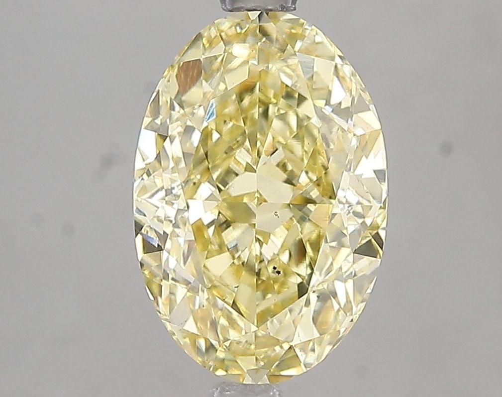 Loose Diamond - OVAL 3.01ct Fancy Intense Yellow VS2: Loose Diamond - OVAL 3.01ct Fancy Intense Yellow VS2 Source: This is a real non-mined Diamond that has been grown in a lab Shape: OVAL Carats: 3.01 Color: Fancy Intense Yellow Certification: IGI Video