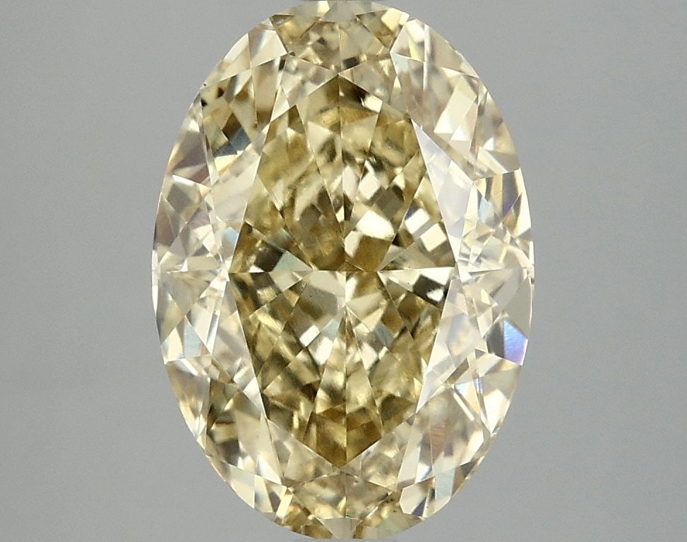 Loose Diamond - OVAL 4.07ct Fancy Vivid Yellow VS1: Loose Diamond - OVAL 4.07ct Fancy Vivid Yellow VS1 Source: This is a real non-mined Diamond that has been grown in a lab Shape: OVAL Carats: 4.07 Color: Fancy Vivid Yellow Certification: IGI Video: