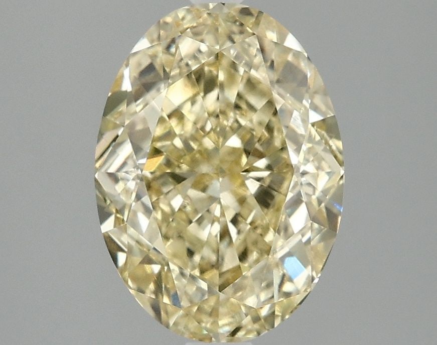 Loose Diamond - OVAL 3.06ct Fancy Yellow VS1: Loose Diamond - OVAL 3.06ct Fancy Yellow VS1 Source: This is a real non-mined Diamond that has been grown in a lab Shape: OVAL Carats: 3.06 Color: Fancy Yellow Certification: IGI Video: