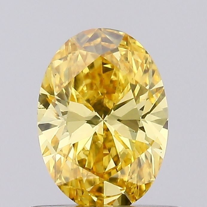 Loose Diamond - OVAL 0.48ct Fancy Vivid Yellow VS2: Loose Diamond - OVAL 0.48ct Fancy Vivid Yellow VS2 Source: This is a real non-mined Diamond that has been grown in a lab Shape: OVAL Carats: 0.48 Color: Fancy Vivid Yellow Certification: IGI Video: