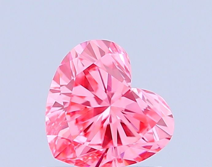 Loose Diamond - HEART 0.85ct Fancy Vivid Pink VVS2: Loose Diamond - HEART 0.85ct Fancy Vivid Pink VVS2 Source: This is a real non-mined Diamond that has been grown in a lab Shape: HEART Carats: 0.85 Color: Fancy Vivid Pink Certification: IGI Video: