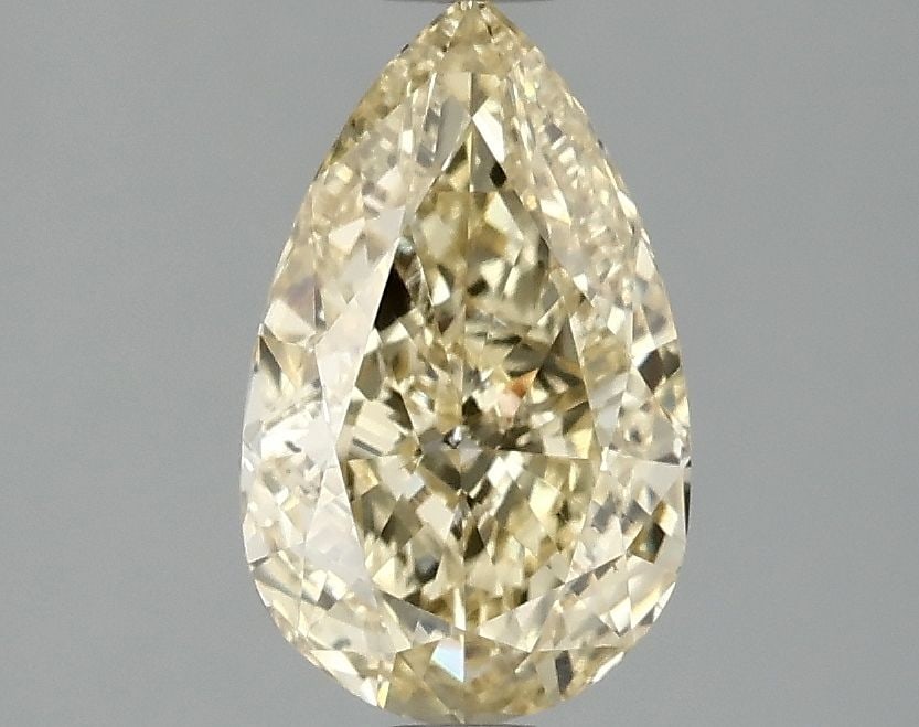 Loose Diamond - PEAR 1.55ct Fancy Vivid Yellow VS2: Loose Diamond - PEAR 1.55ct Fancy Vivid Yellow VS2 Source: This is a real non-mined Diamond that has been grown in a lab Shape: PEAR Carats: 1.55 Color: Fancy Vivid Yellow Certification: IGI Video:
