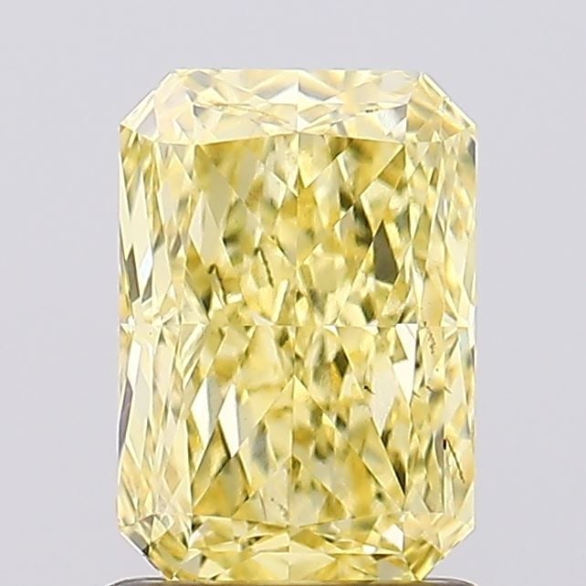 Loose Diamond - RADIANT 1.34ct Fancy Vivid Yellow VS1: Loose Diamond - RADIANT 1.34ct Fancy Vivid Yellow VS1 Source: This is a real non-mined Diamond that has been grown in a lab Shape: RADIANT Carats: 1.34 Color: Fancy Vivid Yellow Certification: IGI Vid