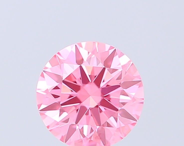 Ideal Loose Diamond - ROUND 0.53ct Fancy Vivid Pink VVS1: Ideal Loose Diamond - ROUND 0.53ct Fancy Vivid Pink VVS1 Source: This is a real non-mined Diamond that has been grown in a lab Shape: ROUND Carats: 0.53 Color: Fancy Vivid Pink Certification: IGI Vide
