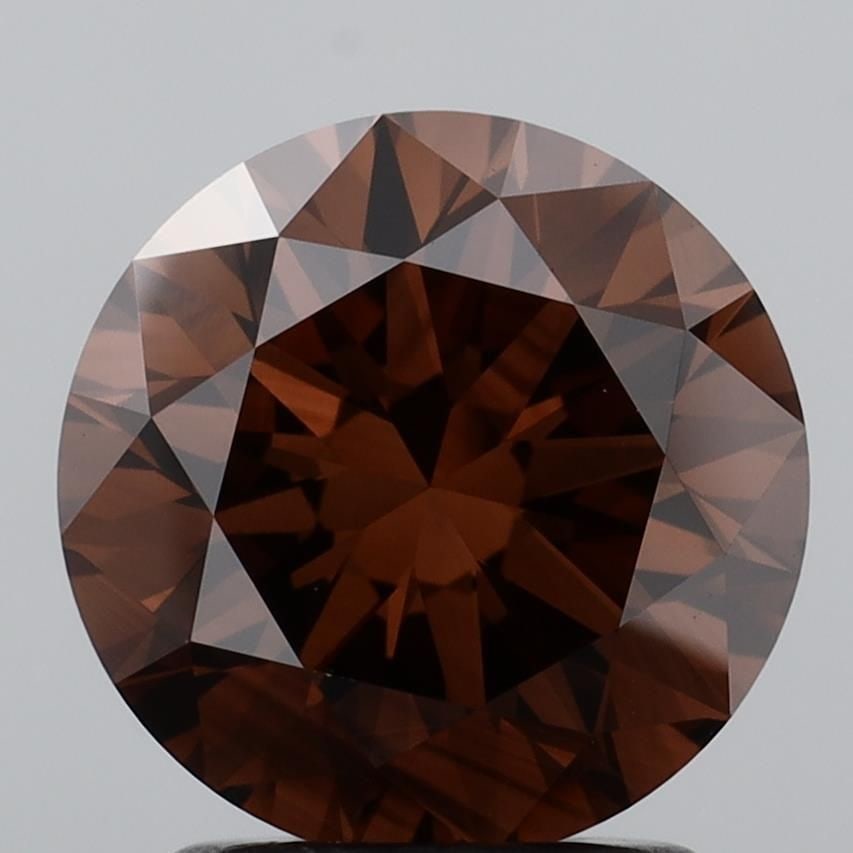 Ideal Loose Diamond - ROUND 2.05ct Fancy Orangey Brown VS2: Ideal Loose Diamond - ROUND 2.05ct Fancy Orangey Brown VS2 Source: This is a real non-mined Diamond that has been grown in a lab Shape: ROUND Carats: 2.05 Color: Fancy Orangey Brown Certification: IGI