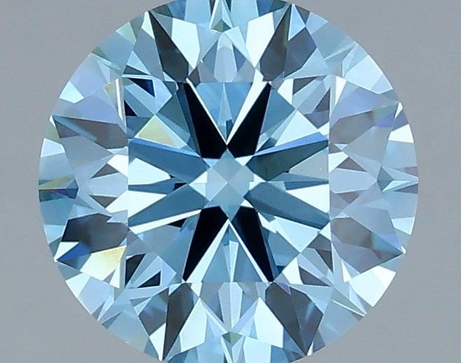 Ideal Loose Diamond - ROUND 2.01ct Fancy Vivid Blue VVS2: Ideal Loose Diamond - ROUND 2.01ct Fancy Vivid Blue VVS2 Source: This is a real non-mined Diamond that has been grown in a lab Shape: ROUND Carats: 2.01 Color: Fancy Vivid Blue Certification: IGI Vide