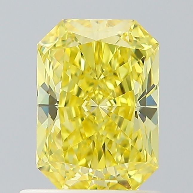 Loose Diamond - RADIANT 1.01ct Fancy Vivid Yellow VS1: Loose Diamond - RADIANT 1.01ct Fancy Vivid Yellow VS1 Source: This is a real non-mined Diamond that has been grown in a lab Shape: RADIANT Carats: 1.01 Color: Fancy Vivid Yellow Certification: IGI Vid