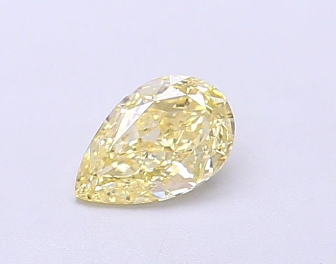 Loose Diamond - PEAR 0.4ct Fancy Light Yellow SI1: Loose Diamond - PEAR 0.4ct Fancy Light Yellow SI1 Source: This is a real non-mined Diamond that has been grown in a lab Shape: PEAR Carats: 0.4 Color: Fancy Light Yellow Certification: IGI Video:
