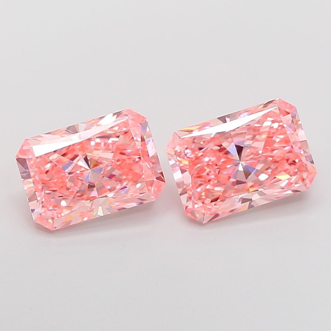 Loose Diamond - RADIANT 3.0ct Fancy Vivid Pink VVS2: Loose Diamond - RADIANT 3.0ct Fancy Vivid Pink VVS2 Source: This is a real non-mined Diamond that has been grown in a lab Shape: RADIANT Carats: 3.0 Color: Fancy Vivid Pink Certification: IGI Video: