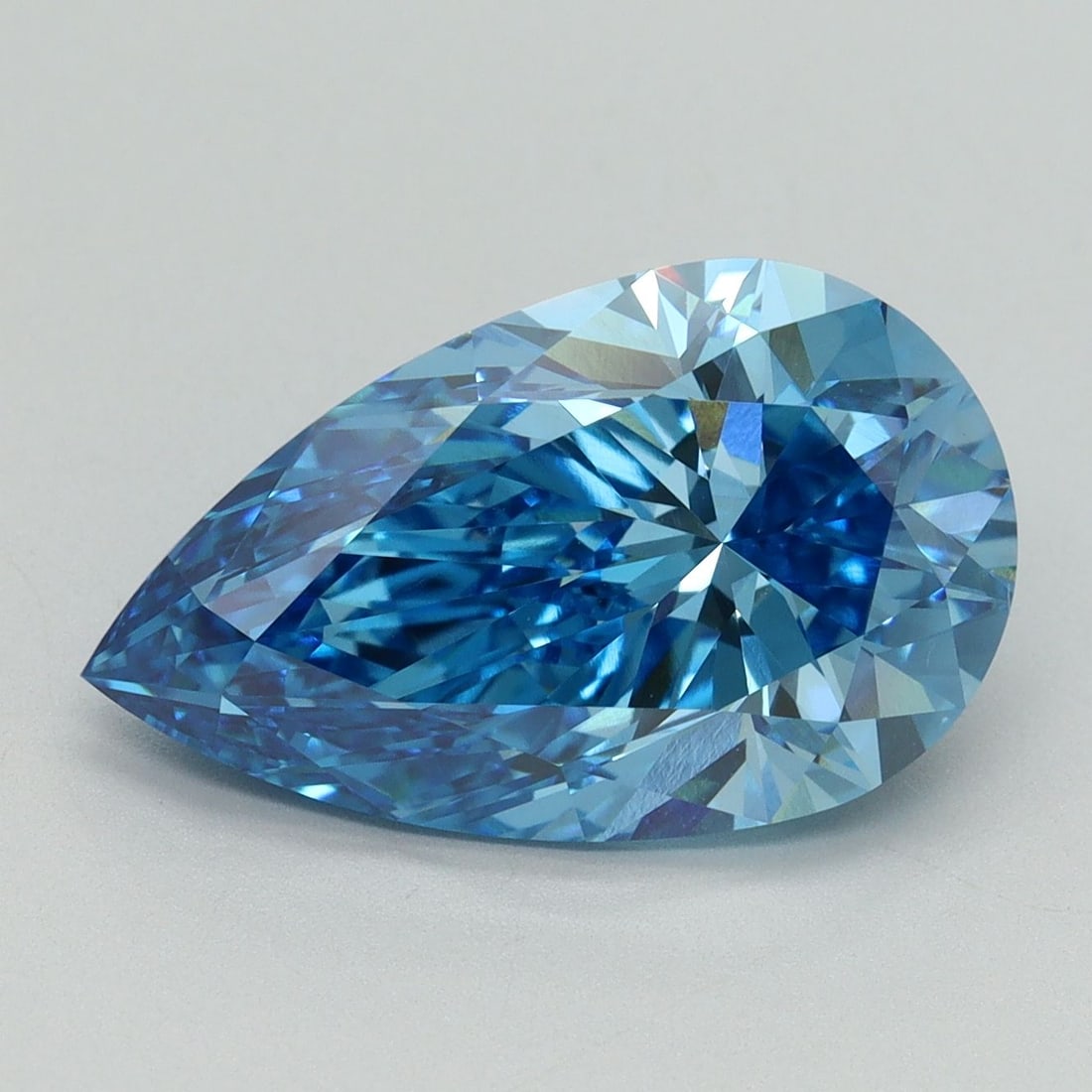 Loose Diamond - PEAR 5.15ct Fancy Vivid Blue VVS2: Loose Diamond - PEAR 5.15ct Fancy Vivid Blue VVS2 Source: This is a real non-mined Diamond that has been grown in a lab Shape: PEAR Carats: 5.15 Color: Fancy Vivid Blue Certification: IGI Video: