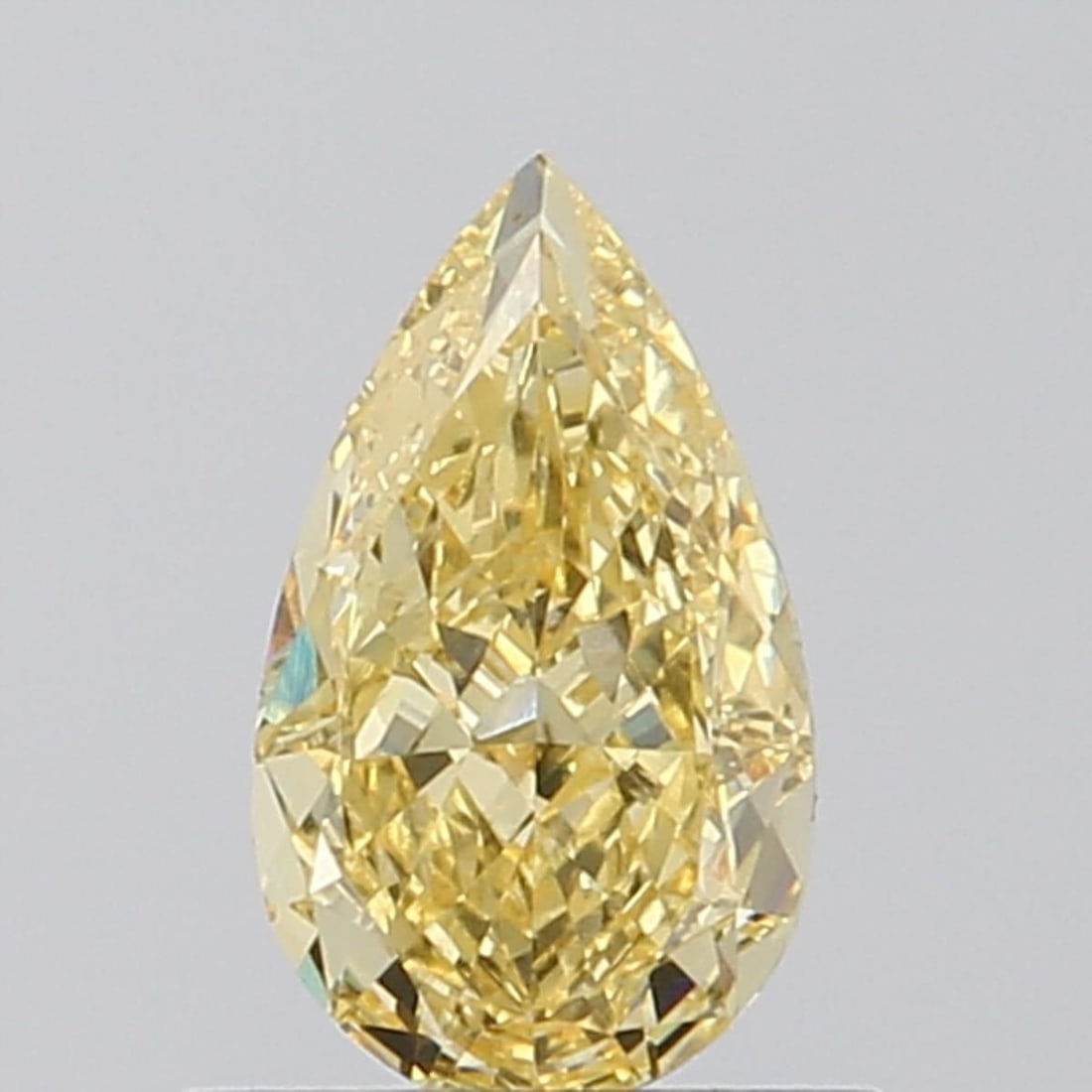Loose Diamond - PEAR 0.81ct Fancy Vivid Yellow VS2: Loose Diamond - PEAR 0.81ct Fancy Vivid Yellow VS2 Source: This is a real non-mined Diamond that has been grown in a lab Shape: PEAR Carats: 0.81 Color: Fancy Vivid Yellow Certification: NONE Video: