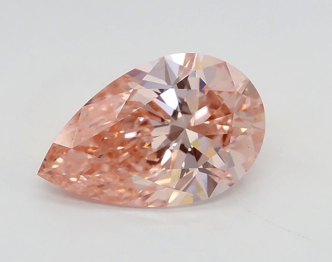 Loose Diamond - PEAR 1.5ct Fancy Vivid Pink VS2: Loose Diamond - PEAR 1.5ct Fancy Vivid Pink VS2 Source: This is a real non-mined Diamond that has been grown in a lab Shape: PEAR Carats: 1.5 Color: Fancy Vivid Pink Certification: IGI Video: