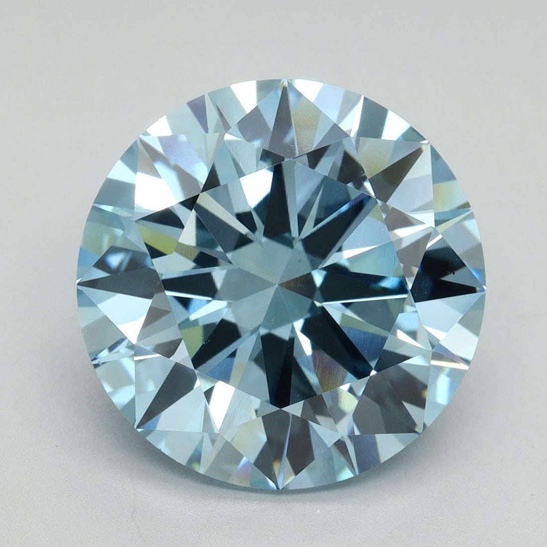 Loose Diamond - ROUND 9.52ct Fancy Vivid Blue VS1: Loose Diamond - ROUND 9.52ct Fancy Vivid Blue VS1 Source: This is a real non-mined Diamond that has been grown in a lab Shape: ROUND Carats: 9.52 Color: Fancy Vivid Blue Certification: IGI Video:
