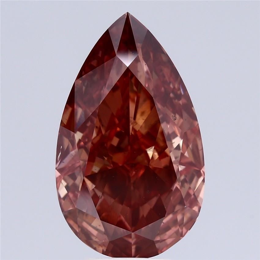 Loose Diamond - PEAR 7.03ct Fancy Vivid Orangey Pink VS1: Loose Diamond - PEAR 7.03ct Fancy Vivid Orangey Pink VS1 Source: This is a real non-mined Diamond that has been grown in a lab Shape: PEAR Carats: 7.03 Color: Fancy Vivid Orangey Pink Certification: N