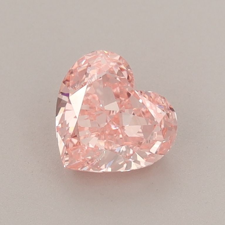 Loose Diamond - HEART 0.88ct Fancy Vivid Pink VVS2: Loose Diamond - HEART 0.88ct Fancy Vivid Pink VVS2 Source: This is a real non-mined Diamond that has been grown in a lab Shape: HEART Carats: 0.88 Color: Fancy Vivid Pink Certification: IGI Video: