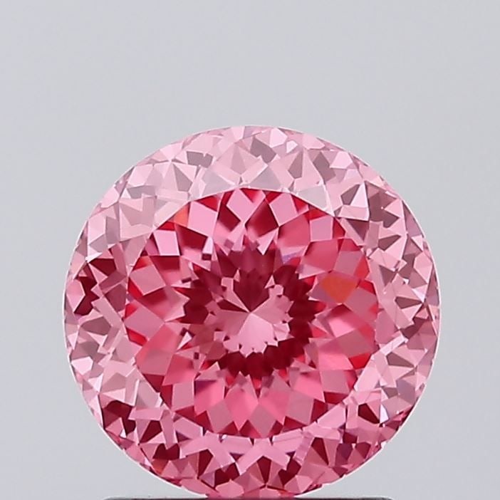 Loose Diamond - ROUND 1.51ct Fancy Vivid Pink VVS2: Loose Diamond - ROUND 1.51ct Fancy Vivid Pink VVS2 Source: This is a real non-mined Diamond that has been grown in a lab Shape: ROUND Carats: 1.51 Color: Fancy Vivid Pink Certification: IGI PLEASE NOT