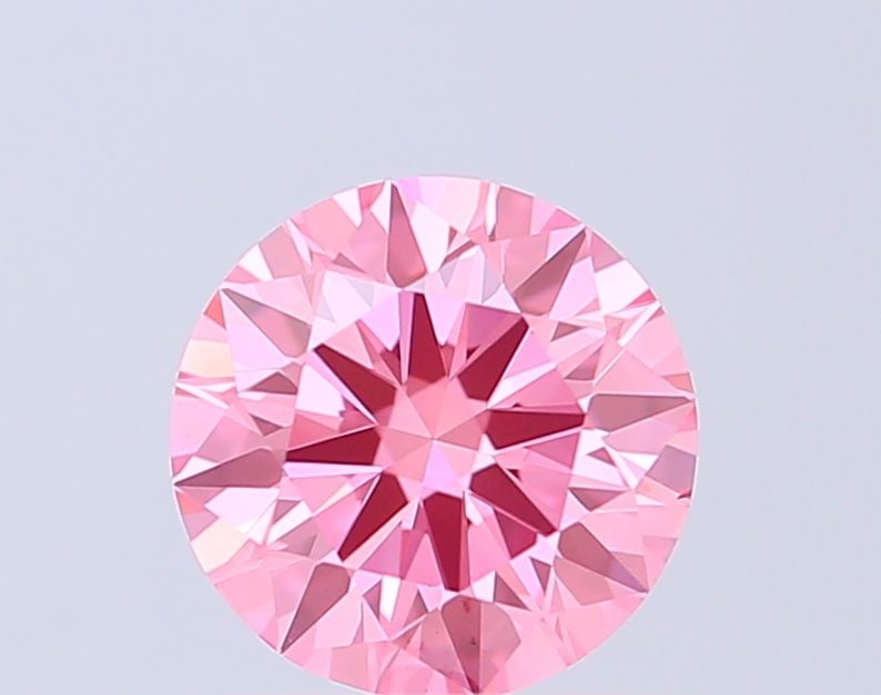 Ideal Loose Diamond - ROUND 1.0ct Fancy Vivid Pink VS1: Ideal Loose Diamond - ROUND 1.0ct Fancy Vivid Pink VS1 Source: This is a real non-mined Diamond that has been grown in a lab Shape: ROUND Carats: 1.0 Color: Fancy Vivid Pink Certification: IGI Video: