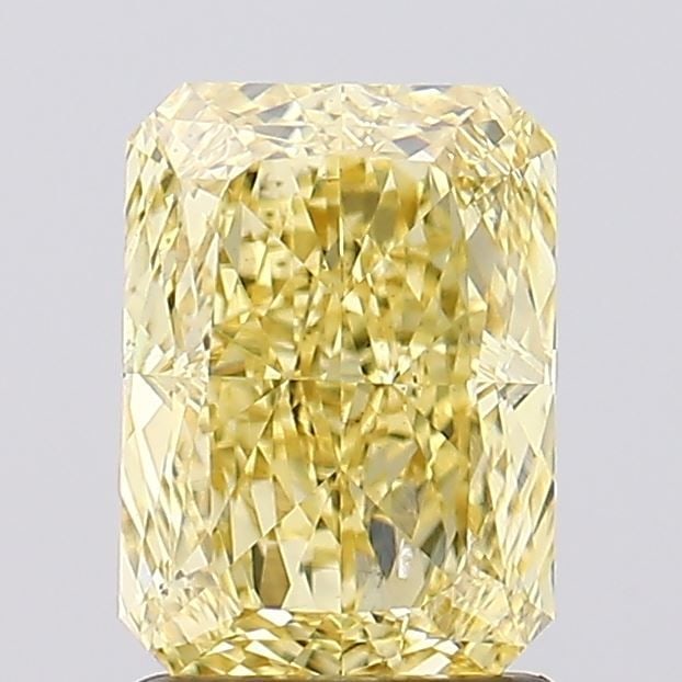 Loose Diamond - RADIANT 1.69ct Fancy Vivid Yellow VS2: Loose Diamond - RADIANT 1.69ct Fancy Vivid Yellow VS2 Source: This is a real non-mined Diamond that has been grown in a lab Shape: RADIANT Carats: 1.69 Color: Fancy Vivid Yellow Certification: IGI Vid