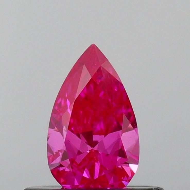 Loose Diamond - PEAR 0.36ct Fancy Vivid Pink VS2: Loose Diamond - PEAR 0.36ct Fancy Vivid Pink VS2 Source: This is a real non-mined Diamond that has been grown in a lab Shape: PEAR Carats: 0.36 Color: Fancy Vivid Pink Certification: IGI Video: