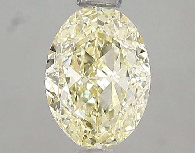 Loose Diamond - OVAL 1.02ct Fancy Light Yellow VS1: Loose Diamond - OVAL 1.02ct Fancy Light Yellow VS1 Source: This is a real non-mined Diamond that has been grown in a lab Shape: OVAL Carats: 1.02 Color: Fancy Light Yellow Certification: IGI Video: