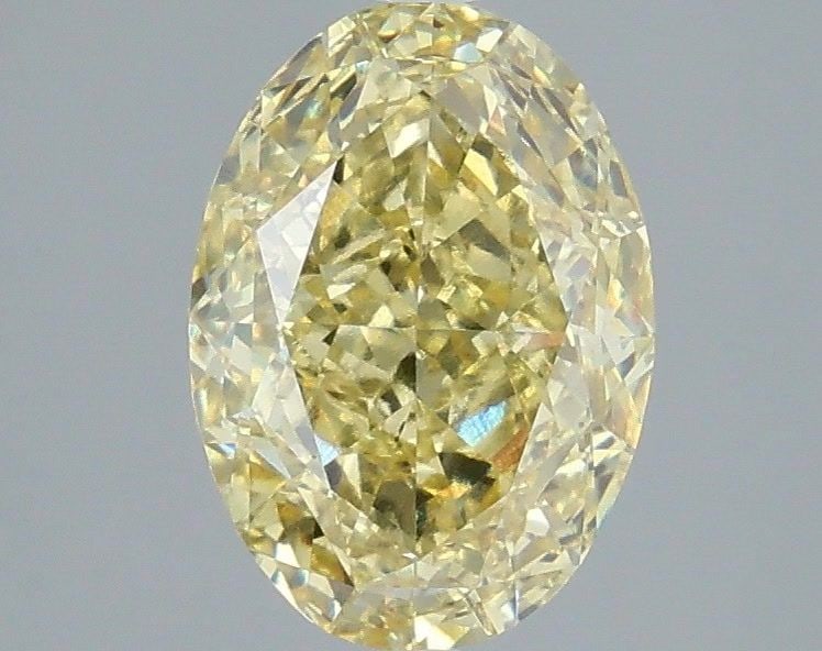 Loose Diamond - OVAL 3.04ct Fancy Intense Yellow VVS2: Loose Diamond - OVAL 3.04ct Fancy Intense Yellow VVS2 Source: This is a real non-mined Diamond that has been grown in a lab Shape: OVAL Carats: 3.04 Color: Fancy Intense Yellow Certification: IGI