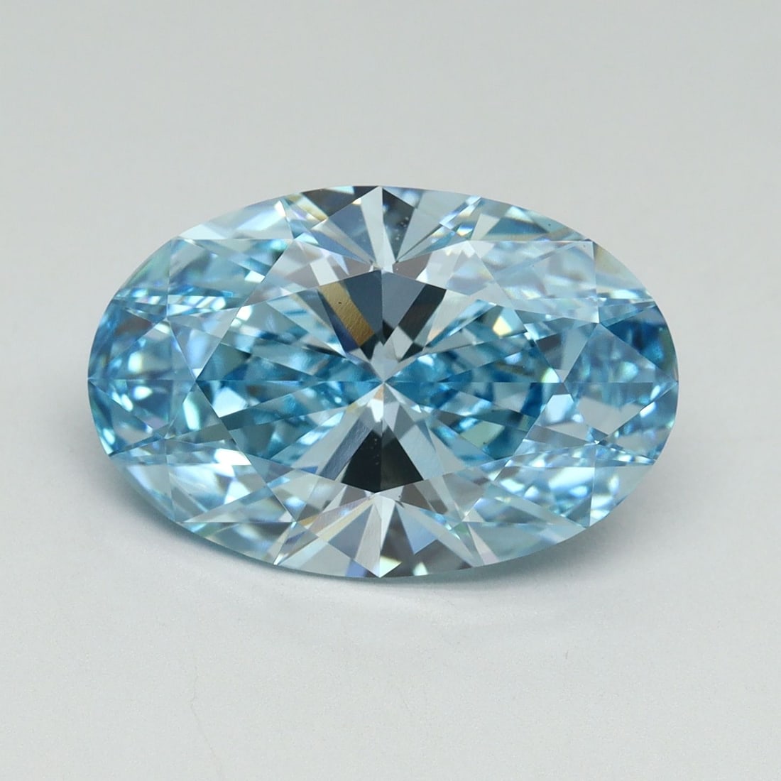 Loose Diamond - OVAL 5.27ct Fancy Vivid Blue VS1: Loose Diamond - OVAL 5.27ct Fancy Vivid Blue VS1 Source: This is a real non-mined Diamond that has been grown in a lab Shape: OVAL Carats: 5.27 Color: Fancy Vivid Blue Certification: IGI Video: