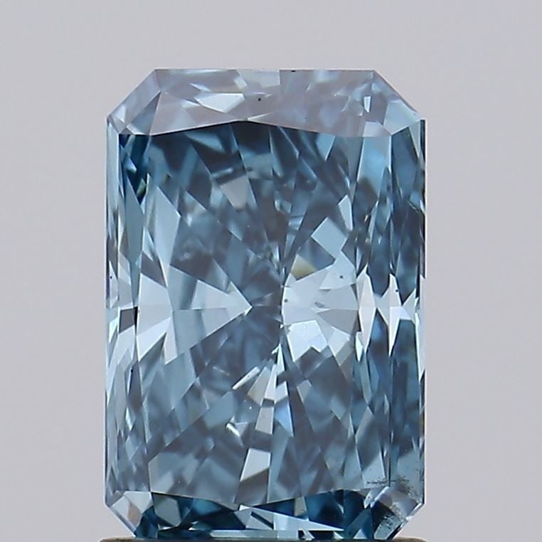 Loose Diamond - RADIANT 1.71ct Fancy Vivid Blue VS2: Loose Diamond - RADIANT 1.71ct Fancy Vivid Blue VS2 Source: This is a real non-mined Diamond that has been grown in a lab Shape: RADIANT Carats: 1.71 Color: Fancy Vivid Blue Certification: IGI Video: