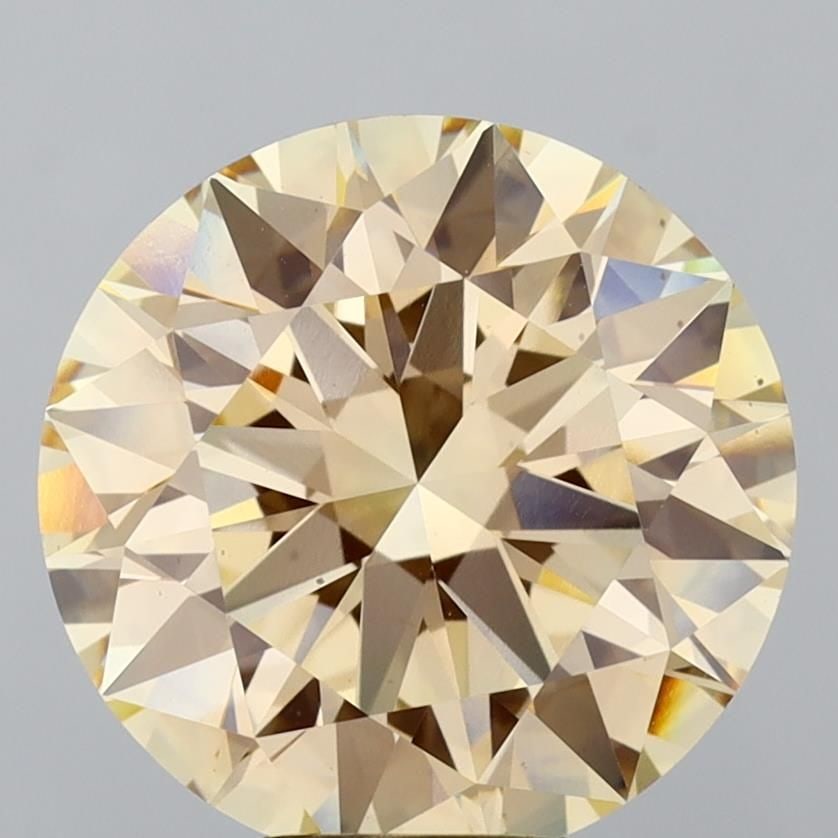 Ideal Loose Diamond - ROUND 6.69ct Very Light Brownish Yellow VVS2: Ideal Loose Diamond - ROUND 6.69ct Very Light Brownish Yellow VVS2 Source: This is a real non-mined Diamond that has been grown in a lab Shape: ROUND Carats: 6.69 Color: Very Light Brownish Yellow Cer