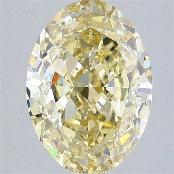 Loose Diamond - OVAL 4.1ct Fancy Yellow VS1: Loose Diamond - OVAL 4.1ct Fancy Yellow VS1 Source: This is a real non-mined Diamond that has been grown in a lab Shape: OVAL Carats: 4.1 Color: Fancy Yellow Certification: IGI Video: