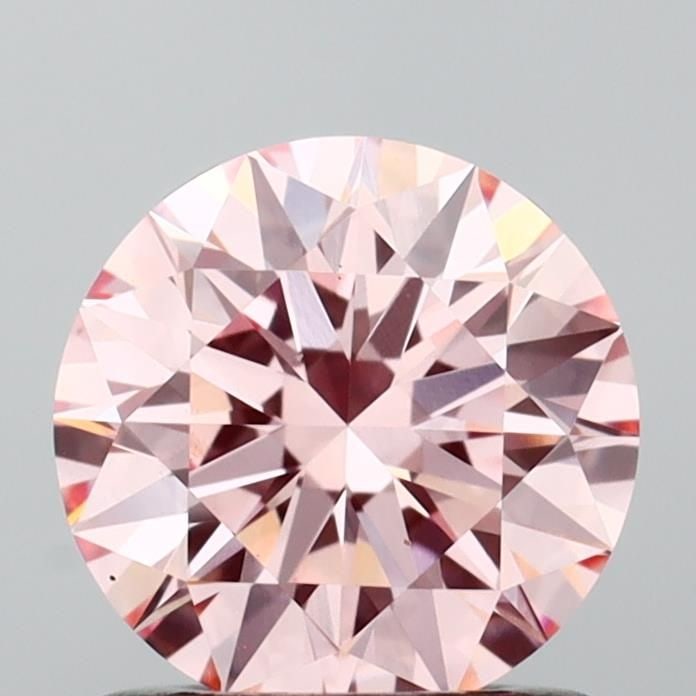 Ideal Loose Diamond - ROUND 0.93ct Fancy Vivid Pink VS1: Ideal Loose Diamond - ROUND 0.93ct Fancy Vivid Pink VS1 Source: This is a real non-mined Diamond that has been grown in a lab Shape: ROUND Carats: 0.93 Color: Fancy Vivid Pink Certification: IGI Video