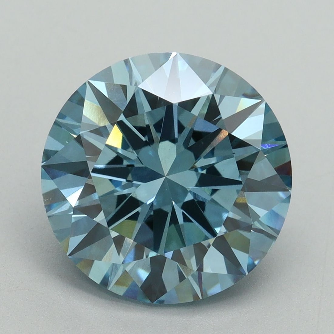Loose Diamond - ROUND 5.19ct Fancy Vivid Blue VS1: Loose Diamond - ROUND 5.19ct Fancy Vivid Blue VS1 Source: This is a real non-mined Diamond that has been grown in a lab Shape: ROUND Carats: 5.19 Color: Fancy Vivid Blue Certification: IGI Video: