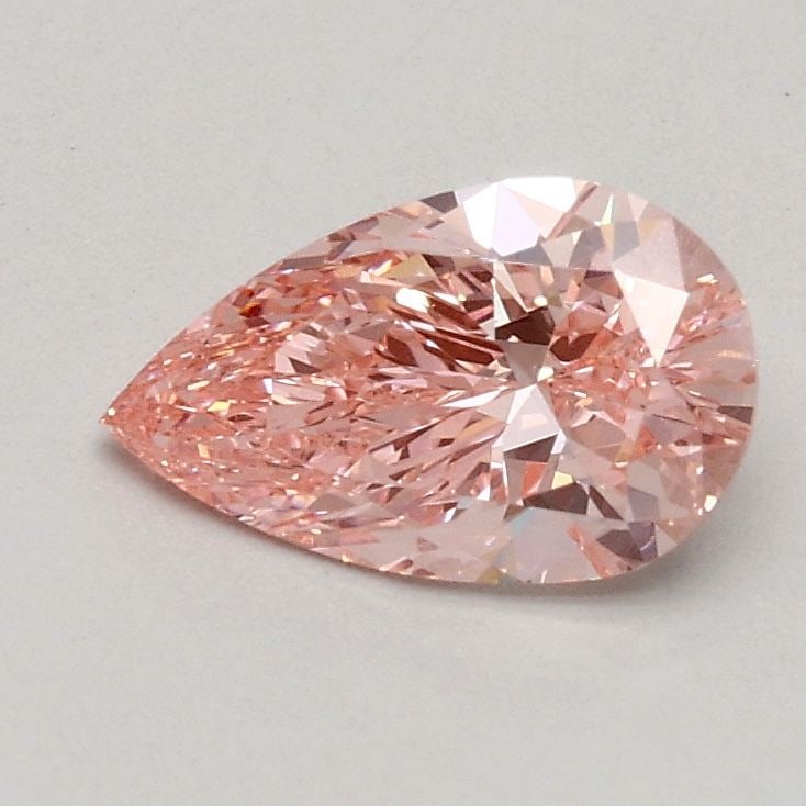 Loose Diamond - PEAR 0.56ct Fancy Vivid Pink VVS2: Loose Diamond - PEAR 0.56ct Fancy Vivid Pink VVS2 Source: This is a real non-mined Diamond that has been grown in a lab Shape: PEAR Carats: 0.56 Color: Fancy Vivid Pink Certification: IGI Video: