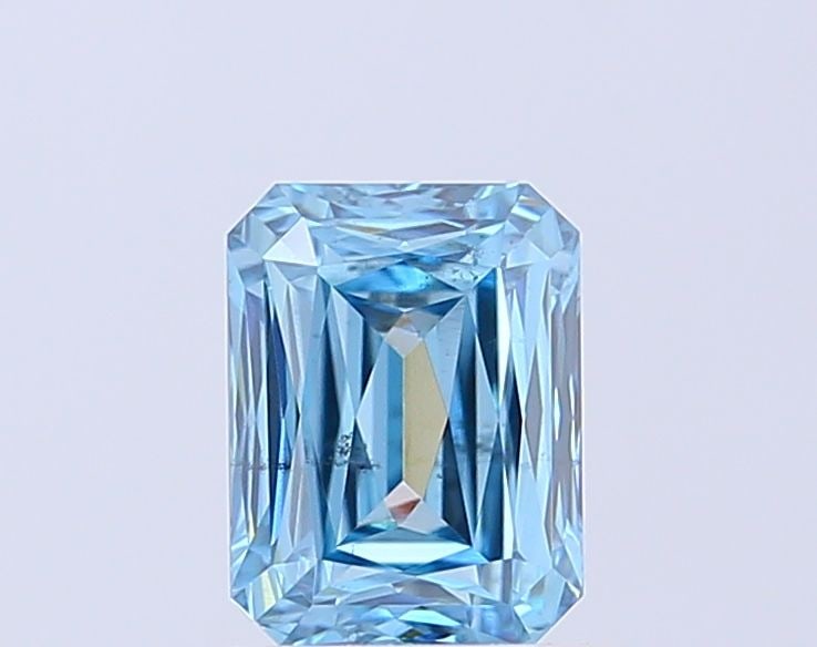 Loose Diamond - RADIANT 1.71ct Fancy Vivid Blue SI1: Loose Diamond - RADIANT 1.71ct Fancy Vivid Blue SI1 Source: This is a real non-mined Diamond that has been grown in a lab Shape: RADIANT Carats: 1.71 Color: Fancy Vivid Blue Certification: IGI Video: