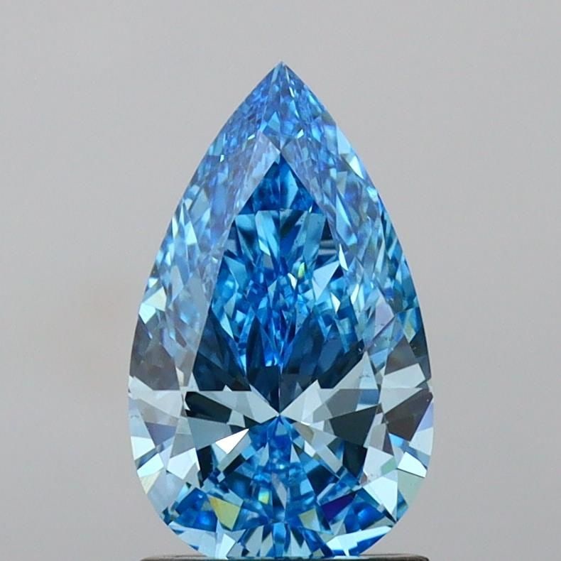 Loose Diamond - PEAR 1.5ct Fancy Vivid Blue VS1: Loose Diamond - PEAR 1.5ct Fancy Vivid Blue VS1 Source: This is a real non-mined Diamond that has been grown in a lab Shape: PEAR Carats: 1.5 Color: Fancy Vivid Blue Certification: IGI PLEASE NOTE: Fr