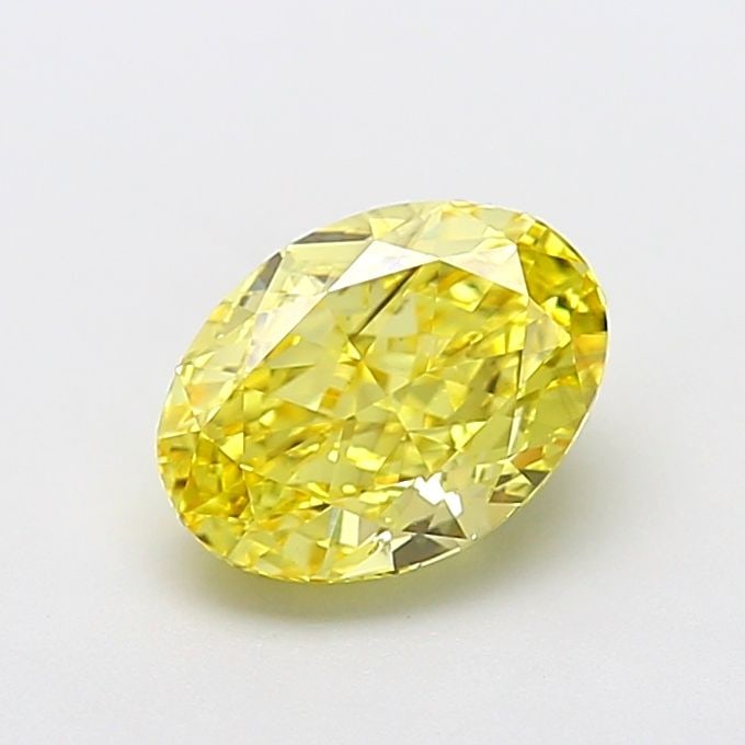 Loose Diamond - OVAL 2.1ct Fancy Vivid Yellow VS2: Loose Diamond - OVAL 2.1ct Fancy Vivid Yellow VS2 Source: This is a real non-mined Diamond that has been grown in a lab Shape: OVAL Carats: 2.1 Color: Fancy Vivid Yellow Certification: IGI Video: