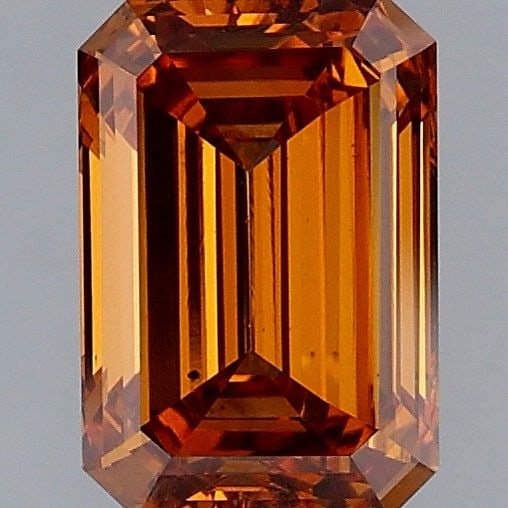 Loose Diamond - EMERALD 1.46ct Fancy Vivid Orange VS2: Loose Diamond - EMERALD 1.46ct Fancy Vivid Orange VS2 Source: This is a real non-mined Diamond that has been grown in a lab Shape: EMERALD Carats: 1.46 Color: Fancy Vivid Orange Certification: IGI Vid