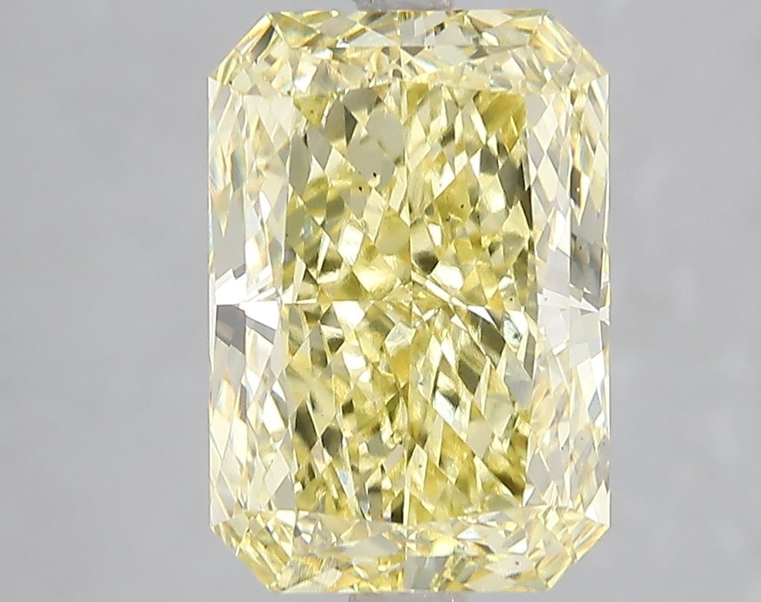 Loose Diamond - RADIANT 5.19ct Fancy Vivid Yellow VS2: Loose Diamond - RADIANT 5.19ct Fancy Vivid Yellow VS2 Source: This is a real non-mined Diamond that has been grown in a lab Shape: RADIANT Carats: 5.19 Color: Fancy Vivid Yellow Certification: IGI Vid