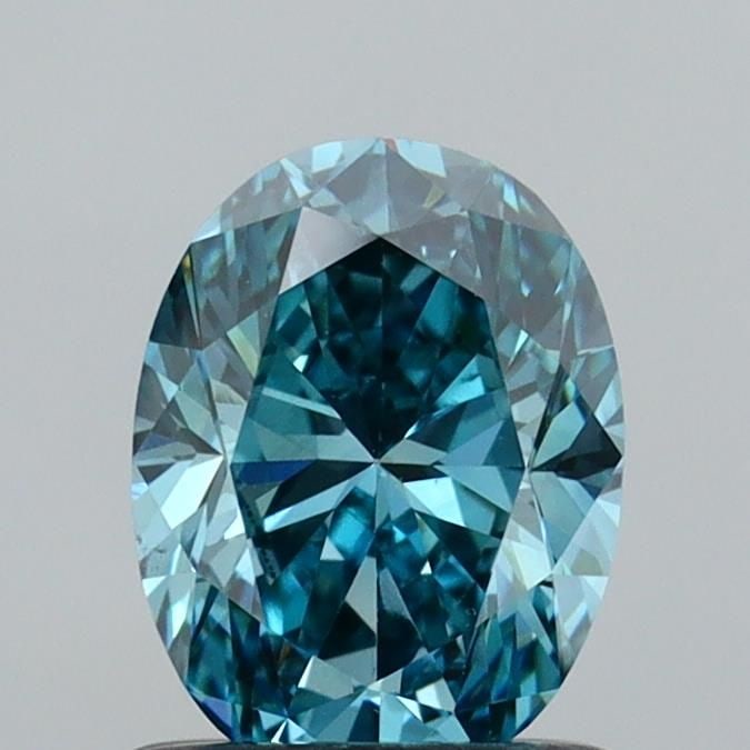 Loose Diamond - OVAL 1.0ct Fancy Vivid Greenish Blue VS1: Loose Diamond - OVAL 1.0ct Fancy Vivid Greenish Blue VS1 Source: This is a real non-mined Diamond that has been grown in a lab Shape: OVAL Carats: 1.0 Color: Fancy Vivid Greenish Blue Certification: I
