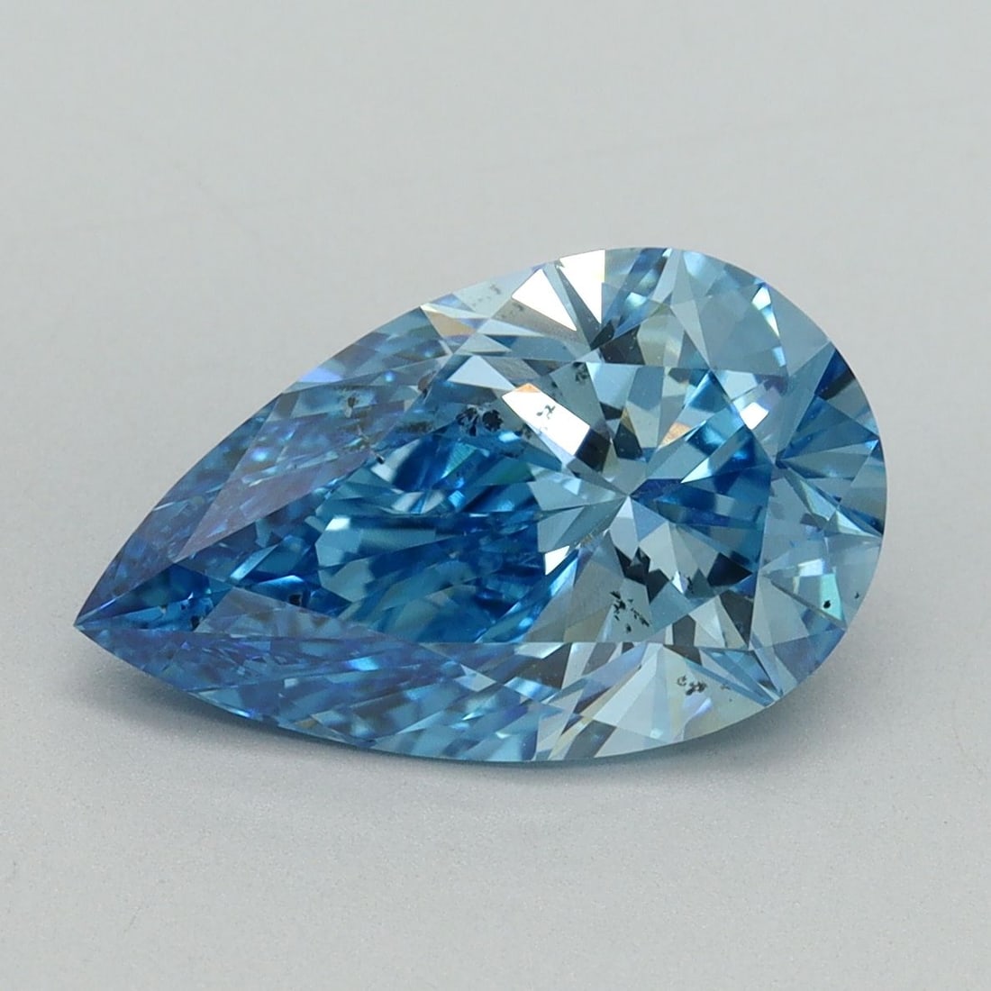 Loose Diamond - PEAR 3.0ct Fancy Vivid Blue SI1: Loose Diamond - PEAR 3.0ct Fancy Vivid Blue SI1 Source: This is a real non-mined Diamond that has been grown in a lab Shape: PEAR Carats: 3.0 Color: Fancy Vivid Blue Certification: IGI Video: