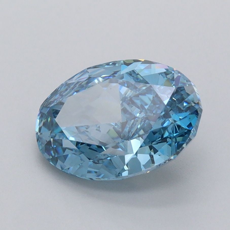 Loose Diamond - OVAL 2.1ct Fancy Vivid Blue VVS2: Loose Diamond - OVAL 2.1ct Fancy Vivid Blue VVS2 Source: This is a real non-mined Diamond that has been grown in a lab Shape: OVAL Carats: 2.1 Color: Fancy Vivid Blue Certification: IGI Video: