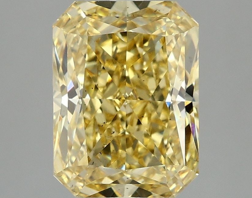 Loose Diamond - RADIANT 3.09ct Fancy Vivid Yellow SI1: Loose Diamond - RADIANT 3.09ct Fancy Vivid Yellow SI1 Source: This is a real non-mined Diamond that has been grown in a lab Shape: RADIANT Carats: 3.09 Color: Fancy Vivid Yellow Certification: IGI Vid