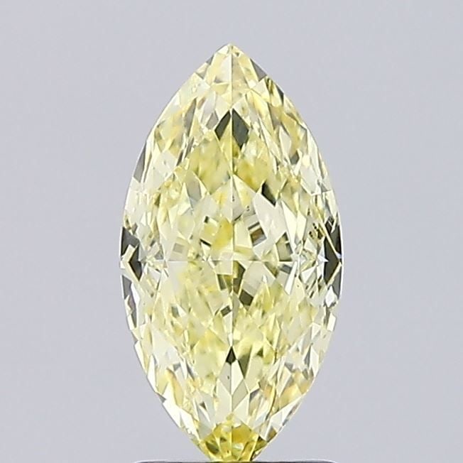 Loose Diamond - MARQUISE 1.87ct Fancy Yellow VVS2: Loose Diamond - MARQUISE 1.87ct Fancy Yellow VVS2 Source: This is a real non-mined Diamond that has been grown in a lab Shape: MARQUISE Carats: 1.87 Color: Fancy Yellow Certification: IGI Video: